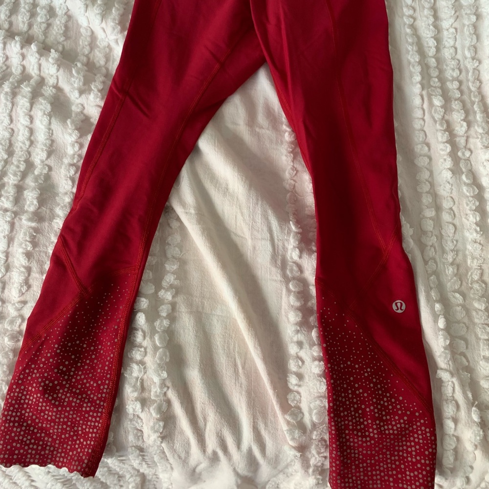 Red Lululemon Tight Stuff 25" leggings Reflective